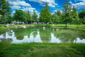 Fototapeta na wymiar The park with thermal springs at Baba Vanga at Rupite, Petrich, Bulgaria in summer time