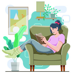 young man sitting on sofa reading book