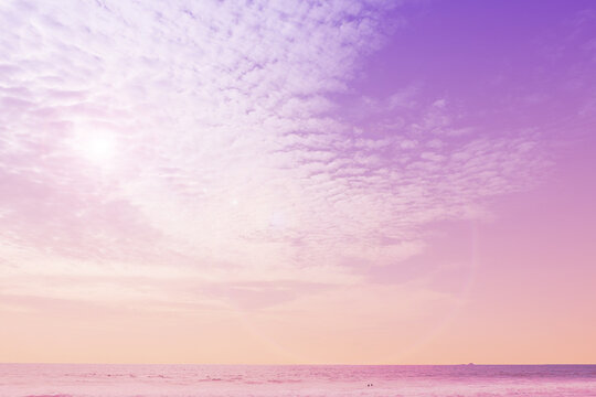 sea ocean beach with cloudy sky in sweet pastel color background