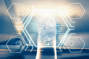Computer on desktop in office with finger print drawing. Double exposure. Concept of business data security.