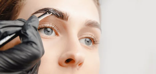 Fotobehang Eyebrow tint, master correction of brow hair women © Parilov