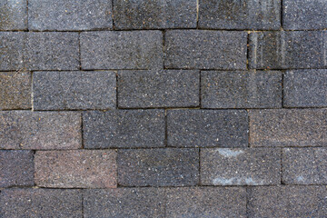 ordinary construction gray slag brick, brick wall, background for walls and wallpapers, large stones in focus