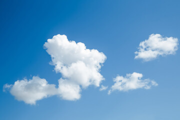 White, Fluffy Clouds In Blue Sky. Background From Clouds