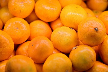 Photo of a lot of orange ready for sale on a tray