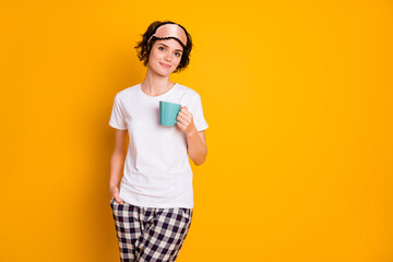 Portrait of her she nice attractive lovely pretty healthy content cheerful cheery brown-haired girl drinking useful herbal green tea isolated on bright vivid shine vibrant yellow color background