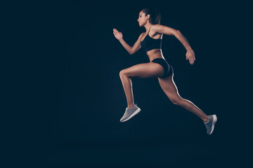 Full size profile photo short sport suit lady sprint run jogger inspired to win race first place member isolated black background