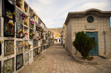 QUITO, ECUADOR- MAY 23, 2017: View of cemetery San Antonio de Pichincha, showing typical catholic graves with a burial vaults