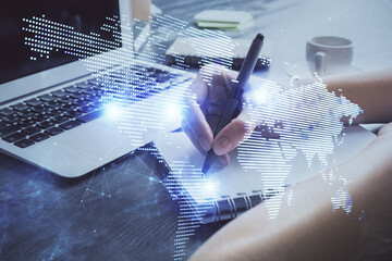 Social network theme hologram over woman's hands writing background. Concept of international...