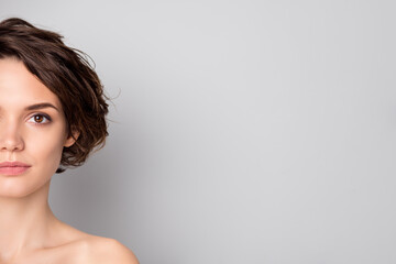 Closeup cropped photo of beautiful nude lady short hairstyle rejuvenation spa salon procedures hiding half facial expression soft shoulder isolated grey color background