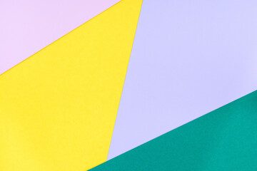 Abstract blank background for template, geometrical pattern made from green, violet, pink and yellow paper, horizontal, copy space