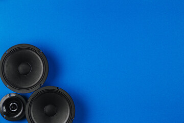 Car audio system on a blue background. Copy space