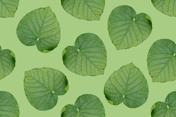 Seamless floral pattern with green leaves.