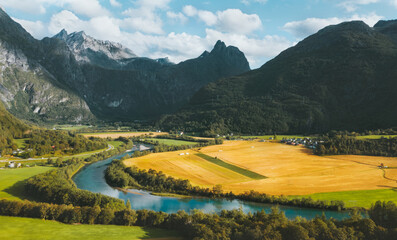 Aerial view Romsdal Mountains valley and river landscape in Norway Travel scenery nature Andalsnes summer season.