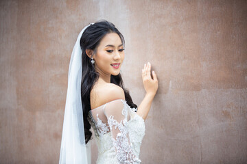 Fototapeta premium young woman in a wedding dress