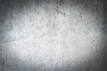 Gray background. Grey wall with a vignette.