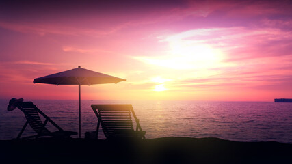 Empty deck chairs and beach umbrella on empty ocean beach.