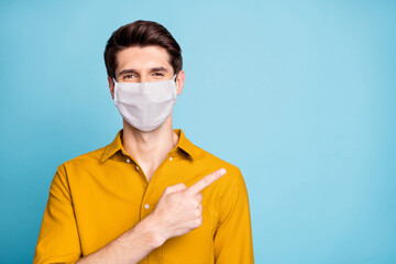 Close-up portrait of his he nice confident healthy guy wearing safety mask demonstrating novelty...