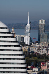 Panorama of the city of Batumi, Georgia. View from the skyscraper. Modern houses, skyscrapers, old buildings. View of the sea and mountains.