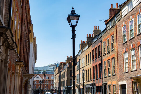 London- Historic street of brick townhouse buildings in Spitalfields area of East London