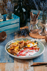 Stewed quail pai potatoes lingonberry sauce eggs