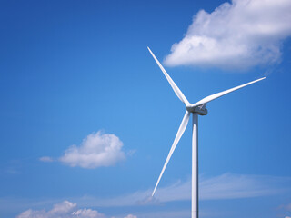 Wind turbine on blue sky