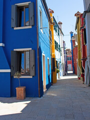 Fototapeta na wymiar Narrow street with typical colored houses.