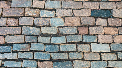 a cobblestone pavement made of rectangular stone in the ancient Peter and Paul Fortress in St. Petersburg, Russia