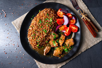 Buckwheat groats baked in the oven with beef goulash