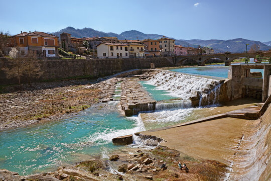 Santa Sofia, Forli Cesena, Emilia Romagna, Italy: landscape of the ancient town crossed by the river with the Apennine mountains on background