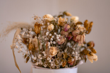Puget of Dried Flowers in White Pot