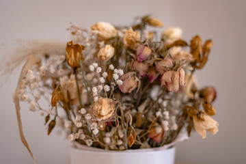 Puget of Dried Flowers in White Pot