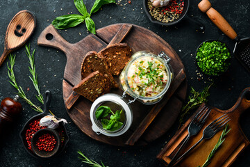 Traditional olivier salad. Vegetable salad with mayonnaise. Top view. Rustic style.