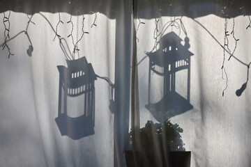 two lanterns hanging on the street for white material, wedding decoration