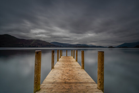 Jetty overlooking lake Derwentwater in the English Lake District on a cloudy day. Close to Ashness bridge and Keswick. 