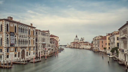 Fototapeta na wymiar Grand canal venice italy in muted colours before sunrise looking towards Salute from Acadamia district