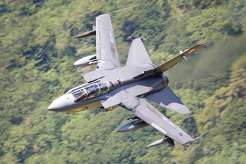 RAF (Royal Air Force) Panavia Tornado GR4 Fighter Bomber and reconnaissance jet flying low level in...