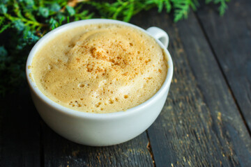 cup of hot coffee and twigs spruce on the table, new year mood Menu concept serving size. food background top view copy space for text
