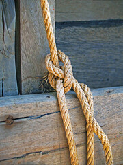rope knot with wood background on the sail boat