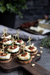 Zucchini sandwiches with soft cheese and sun dried tomatoes 