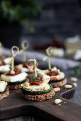 Zucchini sandwiches with soft cheese and sun dried tomatoes 