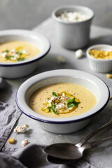 Vegan corn soup with popcorn 