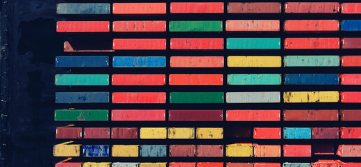 Top view aerial photo of freight containers in rows at harbor. Global Logistics Shipping industry. Export and Import transportation services. Cargo container with copy space for shipping brand goods