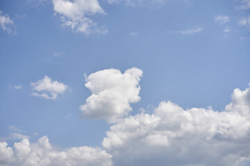 Blue sky with white fluffy cloud summer sunny day