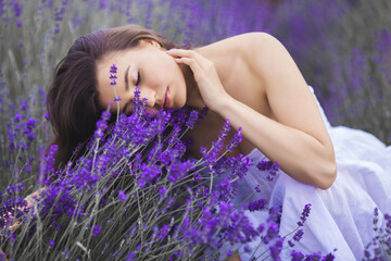 Beautiful young woman in lavander field
