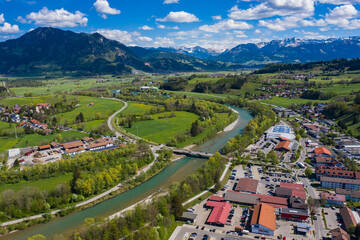  Aerial view of the city Immenstadt im Allgäu in Germany, Bavaria on a sunny spring day during the coronavirus lockdown.
