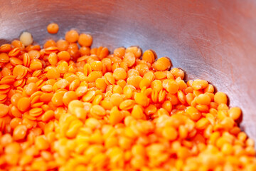 Red Lentil Preparation . Lens Esculenta legume background