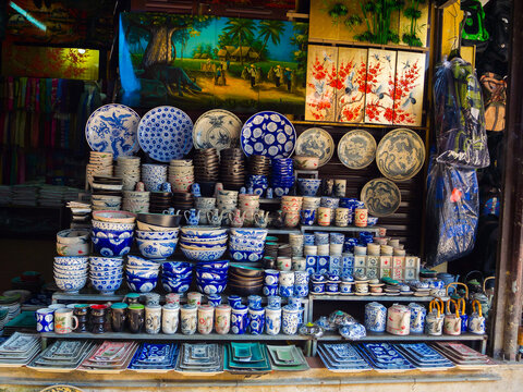 Hoian, Vietnam - August 05, 2017: Common traditional pottery products on a shop in Bat Trang ancient ceramic village. Bat Trang village is the oldest and best known pottery village of Vietnam