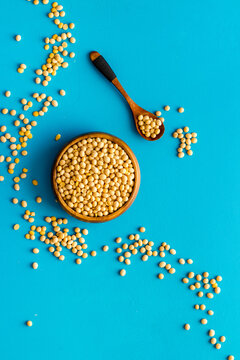 Soybeans In Bowl On Blue Background From Above