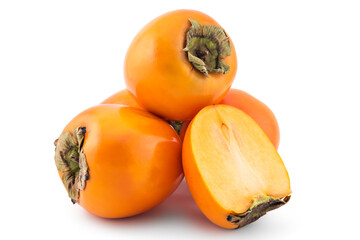 Fresh raw persimmon fruit isolated on white background, one cutted in half