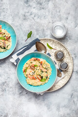 Orzo pasta with king shrimp, sun-dried tomatoes and spinach